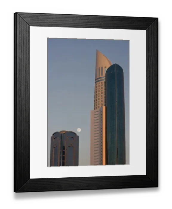 Framed Print : UAE, Dubai. Full moon rising between Park Place Tower and another building Framed Print : UAE, Dubai. Full moon rising between Park Place Tower and another building