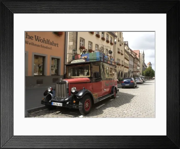 Framed Print : This vintage car is both a popular attraction for visitors and a promotional vehicle Framed Print : This vintage car is both a popular attraction for visitors and a promotional vehicle