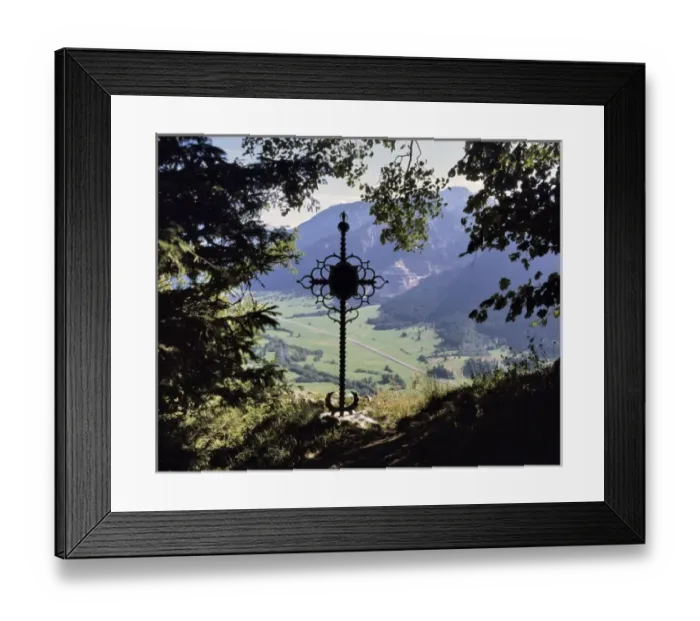 Framed Print : Germany, Bavaria. A wrought-iron cross looks down on a peaceful valley in Bavaria, Germany Framed Print : Germany, Bavaria. A wrought-iron cross looks down on a peaceful valley in Bavaria, Germany