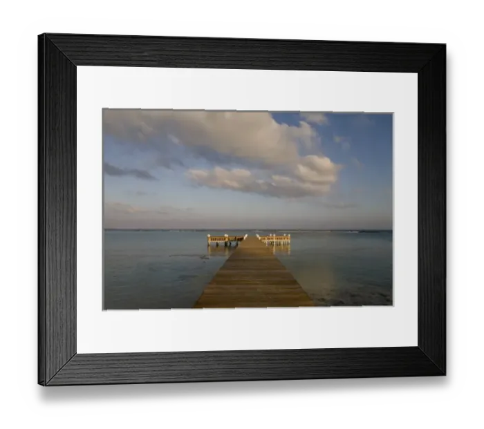 Framed Print : Cayman Islands, Little Cayman Island, Setting sun lights wooden boat pier in Caribbean Framed Print : Cayman Islands, Little Cayman Island, Setting sun lights wooden boat pier in Caribbean