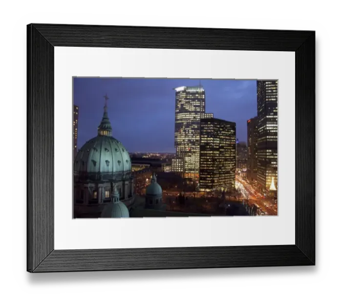 Framed Print : Canada, Quebec, Montreal. Night view of Cathedrale Marie-Reine-du-Monde and downtown Montreral