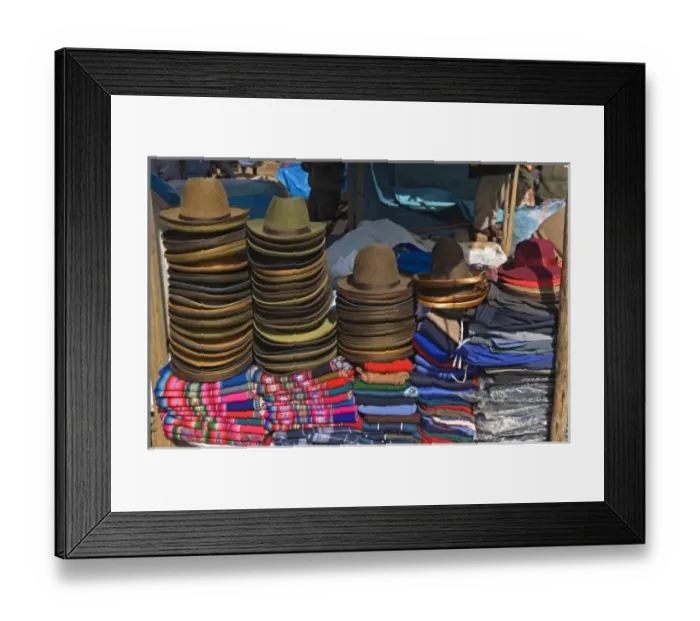Framed Print : Peru, Pisac, Hats and clothes for sale at market Framed Print : Peru, Pisac, Hats and clothes for sale at market