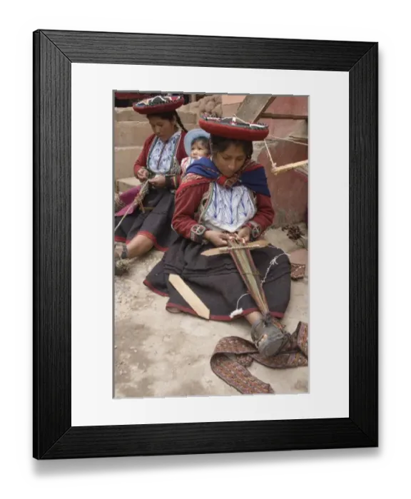 Framed Print : Women in traditional dress and hat weaving using a backstrap loom to weave, Chinchero Framed Print : Women in traditional dress and hat weaving using a backstrap loom to weave, Chinchero