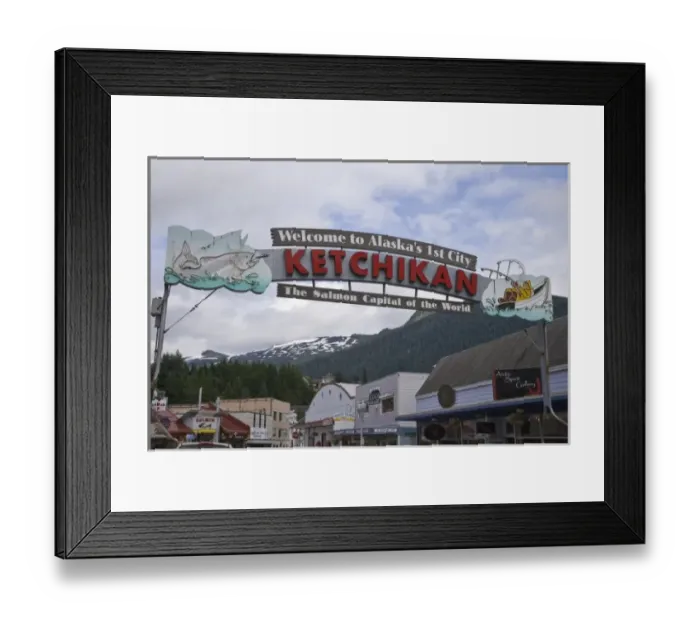 Framed Print : USA, Alaska, Ketchikan. Welcome sign spans street lined with businesses Framed Print : USA, Alaska, Ketchikan. Welcome sign spans street lined with businesses