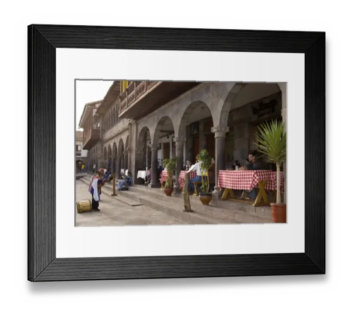 Framed Print : Musician playing for tourists having lunch on patio, Plaza de Armas, Cuzco, Peru Framed Print : Musician playing for tourists having lunch on patio, Plaza de Armas, Cuzco, Peru