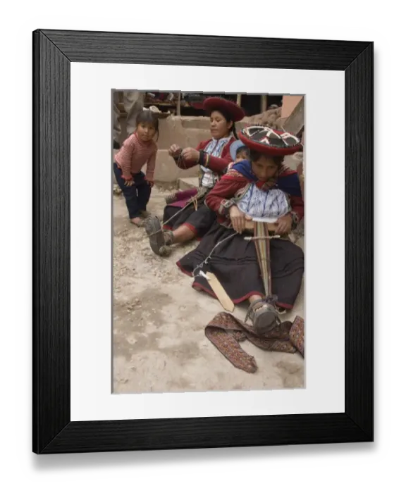 Framed Print : Women in traditional dress and hat weaving using a backstrap loom to weave, Chinchero Framed Print : Women in traditional dress and hat weaving using a backstrap loom to weave, Chinchero