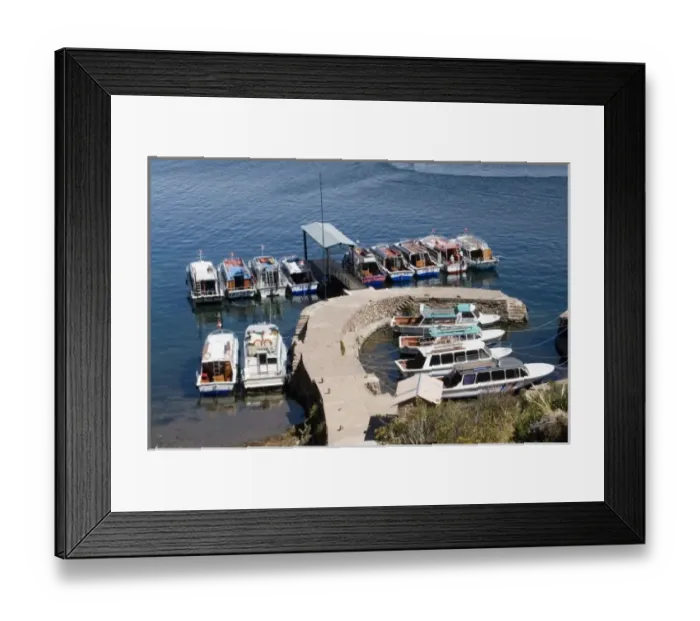 Framed Print : South America - Peru. Boats at the dock at Taquile Island on Lake Titicaca Framed Print : South America - Peru. Boats at the dock at Taquile Island on Lake Titicaca