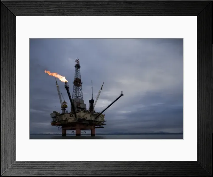 Framed Print : USA, Alaska, Offshore oil drilling rigs with burning natural gas flares in Cook Inlet Framed Print : USA, Alaska, Offshore oil drilling rigs with burning natural gas flares in Cook Inlet