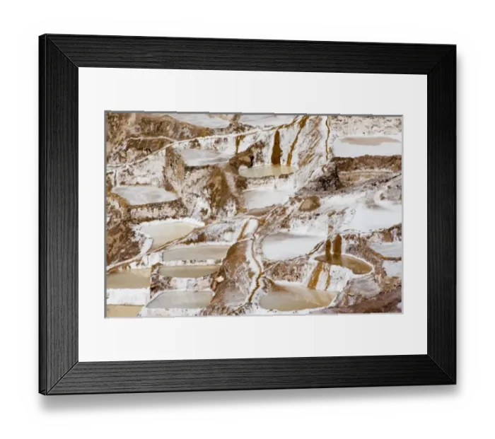 Framed Print : South America - Peru. Salt ponds near Maras where the salt water evaporates and salt