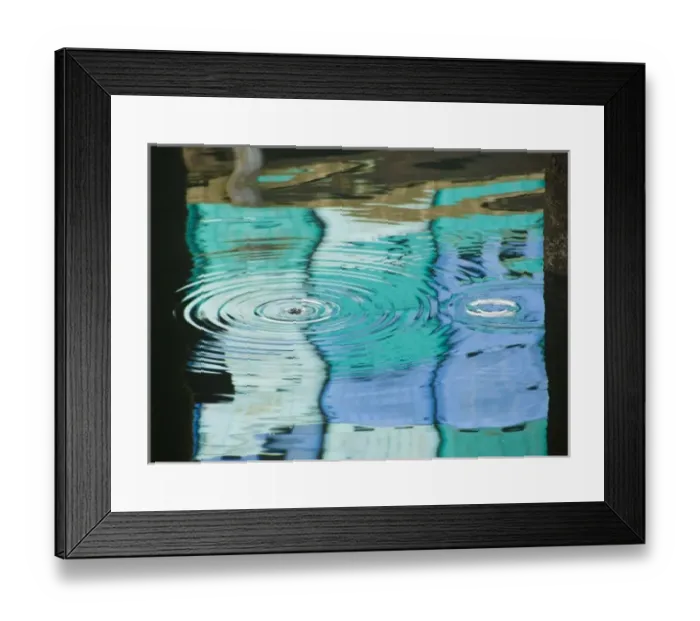 Framed Print : USA, Alaska, Petersburg. Reflections of harbor buildings in water