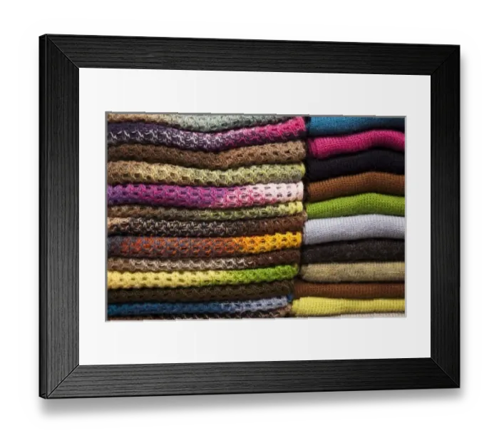 Framed Print : South America, Peru, Aguas Calientes. Stack of colorful textiles made of alpaca wool Framed Print : South America, Peru, Aguas Calientes. Stack of colorful textiles made of alpaca wool