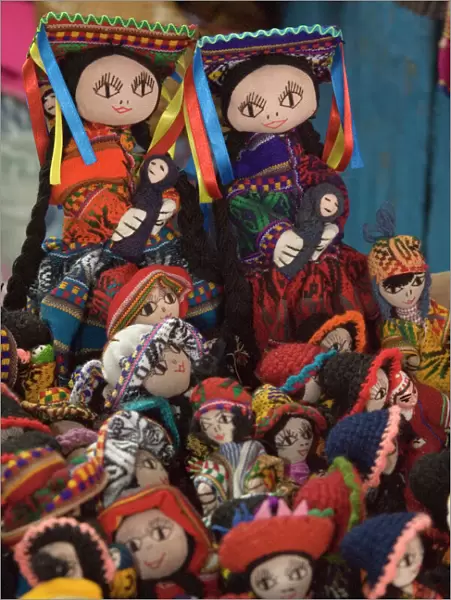 Dolls displayed in market, Cuzco, Peru