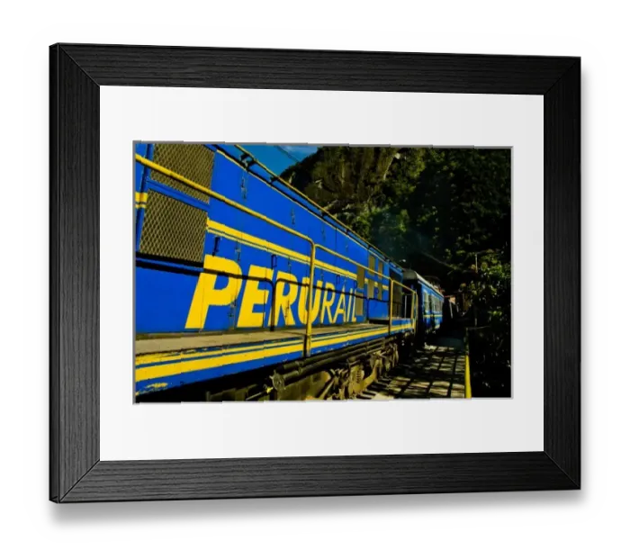 Framed Print : Passenger trains run right down the main street of the small village of Aguas Calientes Framed Print : Passenger trains run right down the main street of the small village of Aguas Calientes