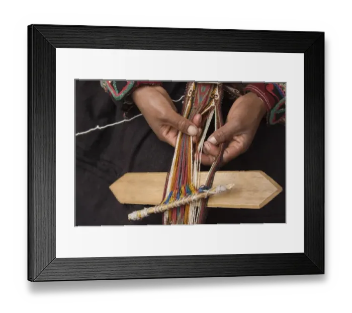 Framed Print : Woman in traditional dress weaving using a backstrap loom (close-up of hands), Chinchero Framed Print : Woman in traditional dress weaving using a backstrap loom (close-up of hands), Chinchero