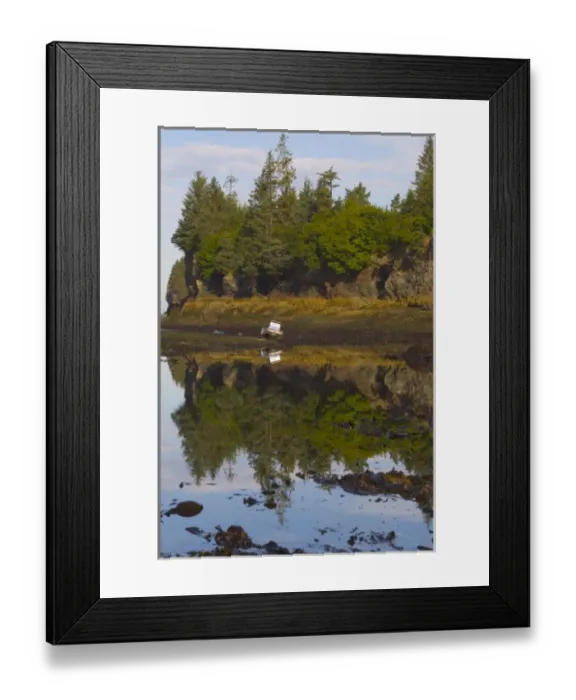 Framed Print : Beached fishing boat and reflection of a rocky outcropping on Kachemak Bay Alaska