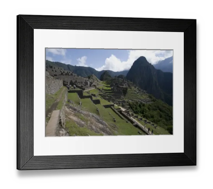 Framed Print : South America - Peru. View of the lost Inca city of Machu Picchu. Huayna Picchu in background Framed Print : South America - Peru. View of the lost Inca city of Machu Picchu. Huayna Picchu in background