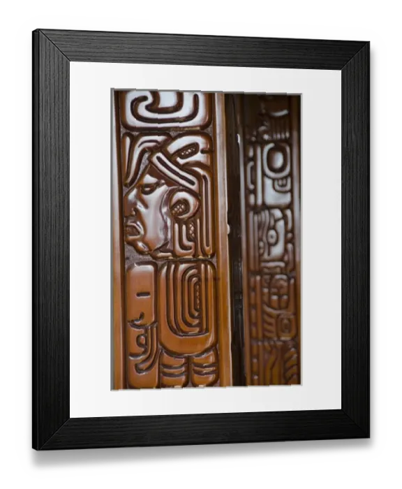 Framed Print : Central America, Belize. Belize City. Handcarved Mayan motif wooden building detail Framed Print : Central America, Belize. Belize City. Handcarved Mayan motif wooden building detail