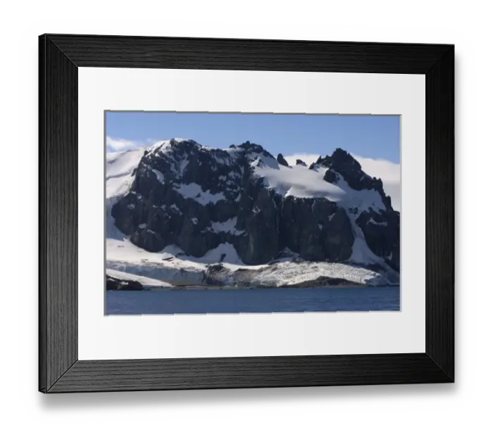Framed Print : frozen glacial mountain landscape along the western Antarctic peninsula, Antarctica Framed Print : frozen glacial mountain landscape along the western Antarctic peninsula, Antarctica