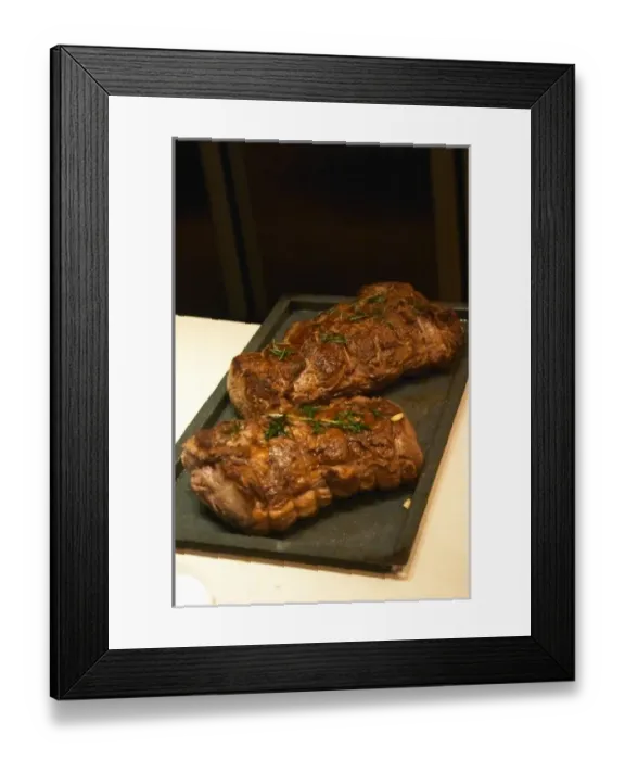 Framed Print : Two big roasts of beef with herbs on them, thyme and rosemary. The Dolly Irigoyen - famous chef Framed Print : Two big roasts of beef with herbs on them, thyme and rosemary. The Dolly Irigoyen - famous chef