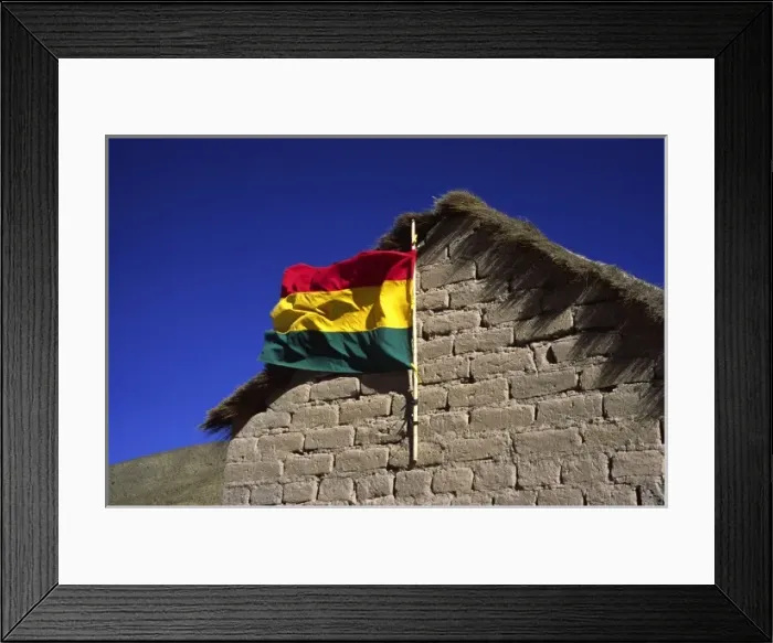 Framed Print : San Antonio, Bolivia, Bolivian flag waving from a mud brick hut in the High Altiplano Framed Print : San Antonio, Bolivia, Bolivian flag waving from a mud brick hut in the High Altiplano