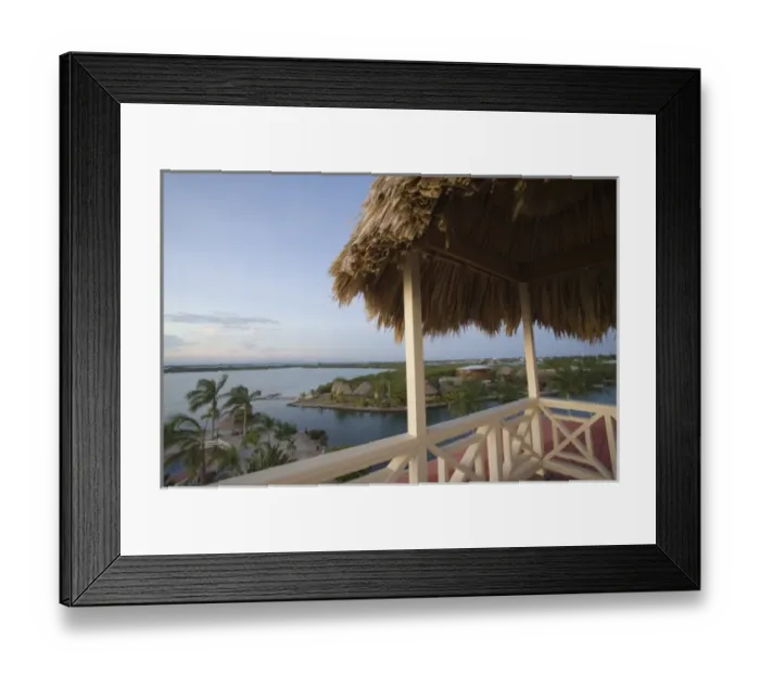 Framed Print : Resort hotels and Caribbean Sea, viewed from roof with thatched palapa, Placencia Framed Print : Resort hotels and Caribbean Sea, viewed from roof with thatched palapa, Placencia
