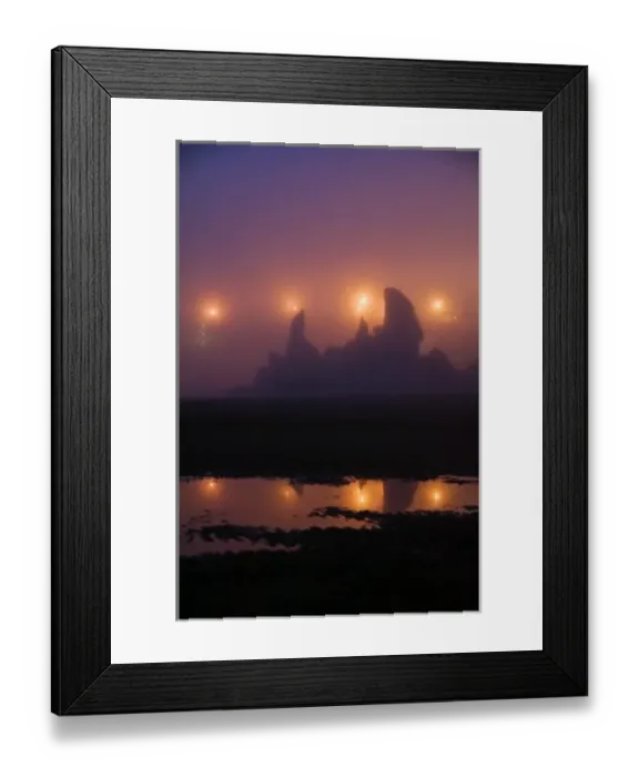 Framed Print : USA, Oregon, Brandon. City night lights silhouette sea stacks in fog at the beach