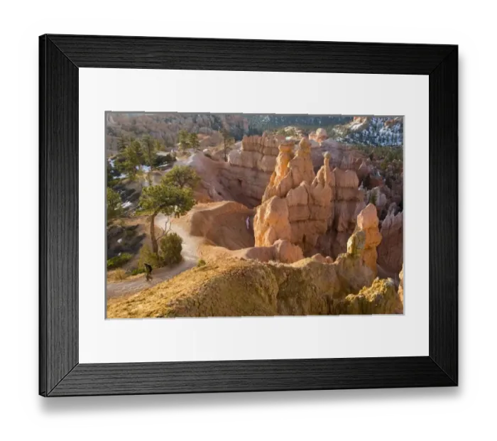 Framed Print : Hiker on Queens Garden Trail amongst the Hoodoos at Sunrise Point in Bryce Canyon