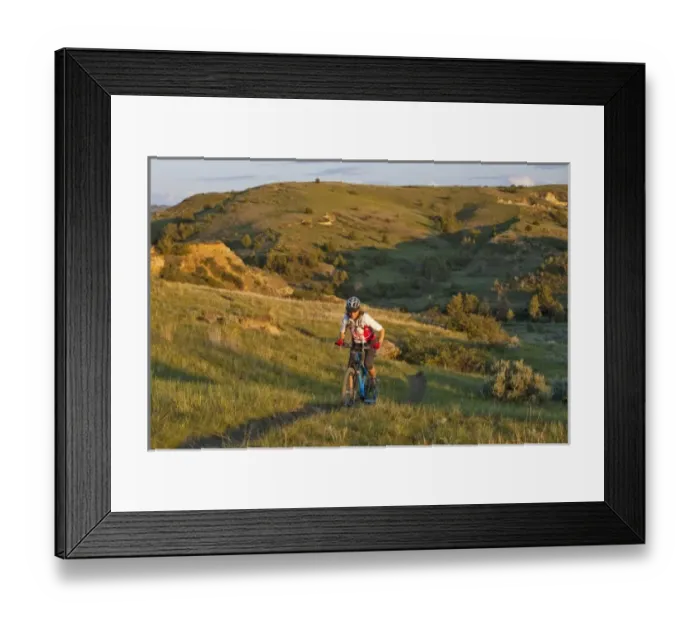 Framed Print : Woman mountain bikes on the Maah Daah Hey Trail near Medora North Dakota (MR) Framed Print : Woman mountain bikes on the Maah Daah Hey Trail near Medora North Dakota (MR)