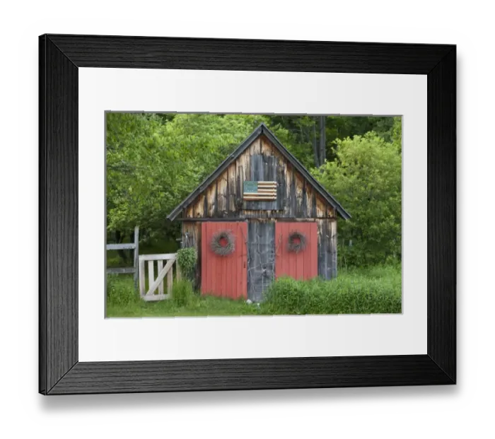 Framed Print : USA, Vermont, Searsburg, Rustic wooden cottage at forests edge on spring evening