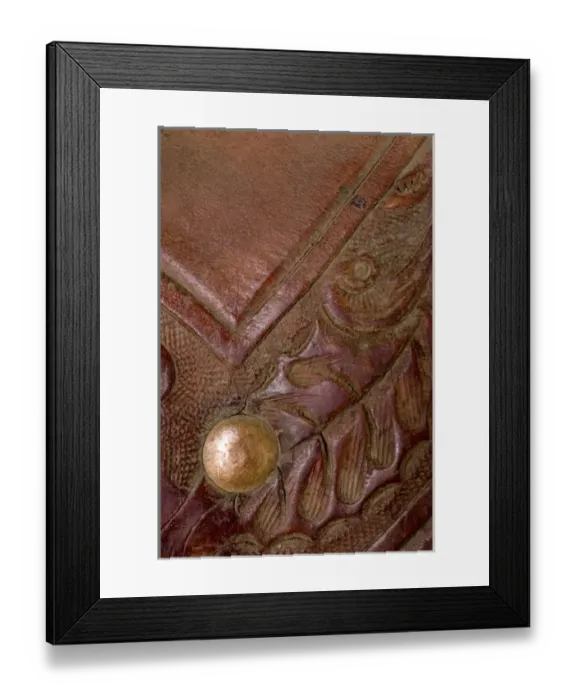 Framed Print : USA, Oregon, Seneca, Ponderosa Ranch. Details of tooling on leather saddle Framed Print : USA, Oregon, Seneca, Ponderosa Ranch. Details of tooling on leather saddle