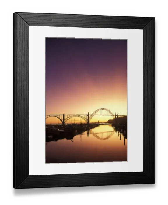 Framed Print : Sun setting behind the Newport Bridge, Oregon Coast Framed Print : Sun setting behind the Newport Bridge, Oregon Coast