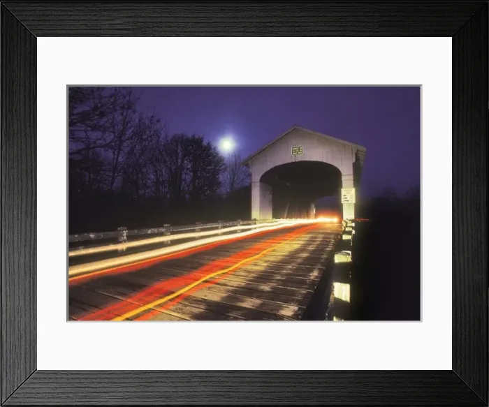 Framed Print : USA, Oregon. Car lights through Earnest covered bridge over Mohawk River at night with a full moon