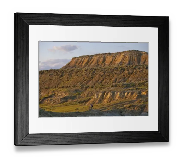 Framed Print : Woman mountain bikes on the Maah Daah Hey Trail near Medora North Dakota (MR) Framed Print : Woman mountain bikes on the Maah Daah Hey Trail near Medora North Dakota (MR)