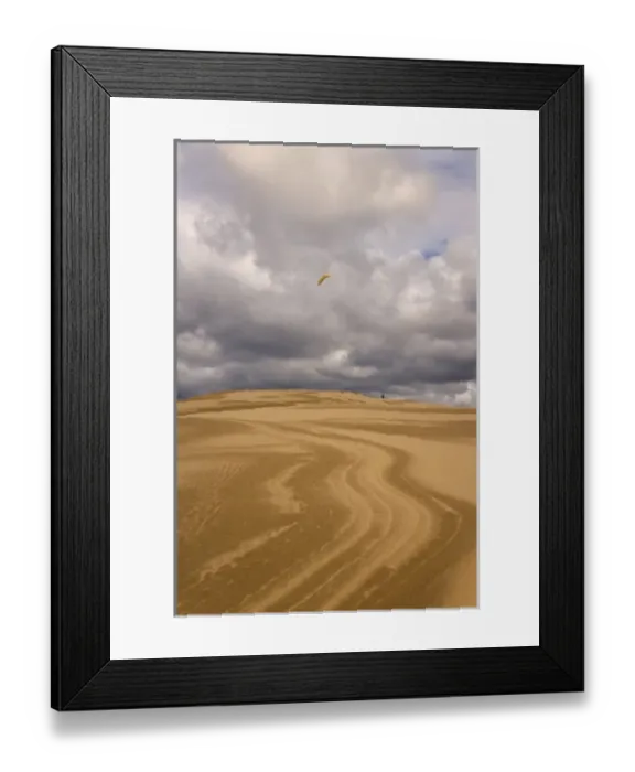 Framed Print : USA, Oregon, Siuslaw National Forest, Umpqua Dunes. Man flying a kite over wavy sand dunes Framed Print : USA, Oregon, Siuslaw National Forest, Umpqua Dunes. Man flying a kite over wavy sand dunes