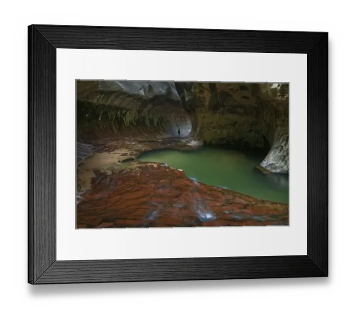Framed Print : USA, Utah, Zion National Park. A female canyoneer silhouetted in the Subway. (MR)