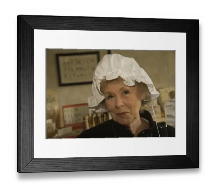 Framed Print : Elderly woman tries on old-fashioned hair bonnet, Colonial Williamsburg Historic Area Framed Print : Elderly woman tries on old-fashioned hair bonnet, Colonial Williamsburg Historic Area