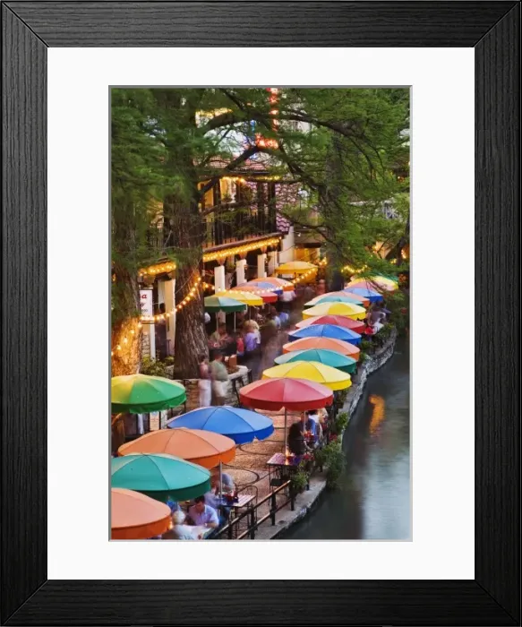 Framed Print : Colorful umbrellas of outdoor cafe along famous River Walk, and San Antonio River Framed Print : Colorful umbrellas of outdoor cafe along famous River Walk, and San Antonio River