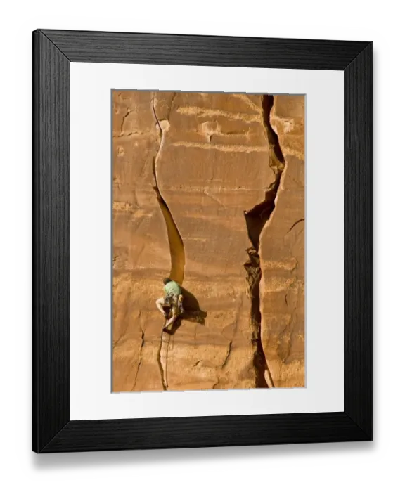 Framed Print : Climbing guide, Moab Desert Adventures in the crux of Miss Kitty likes it that way
