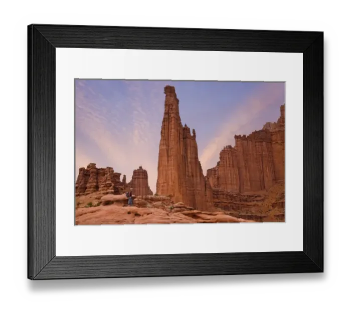 Framed Print : USA, Utah. Hiker watches sunset on Fisher Towers sandstone formations Framed Print : USA, Utah. Hiker watches sunset on Fisher Towers sandstone formations