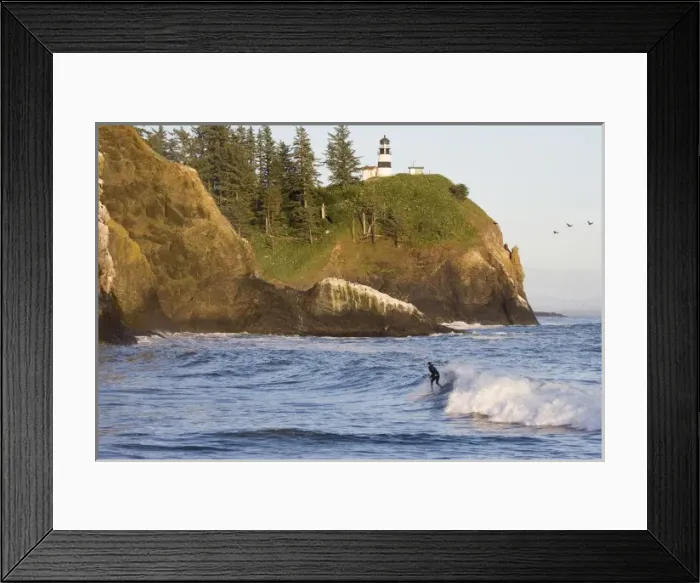 Framed Print : USA, Washington, Cape Disappointment Lighthouse. Male surfer Framed Print : USA, Washington, Cape Disappointment Lighthouse. Male surfer
