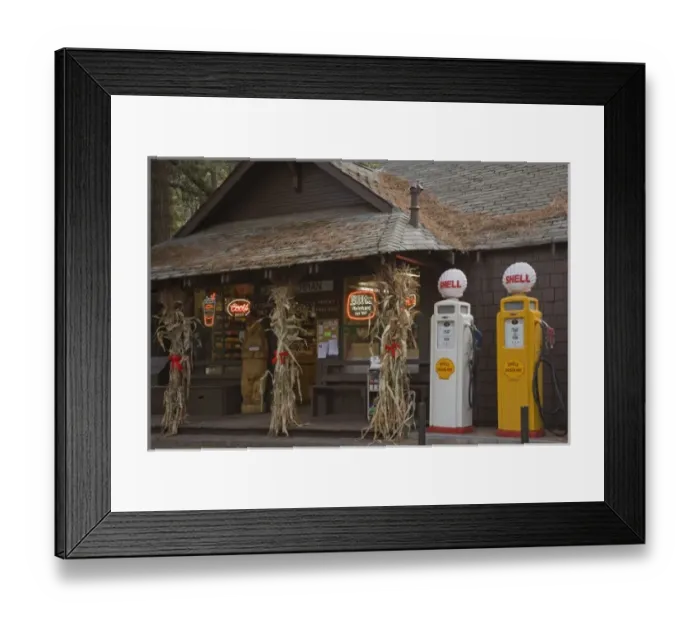 Framed Print : USA, Oregon, Camp Sherman. Two vintage gasoline pumps displayed in front of store Framed Print : USA, Oregon, Camp Sherman. Two vintage gasoline pumps displayed in front of store