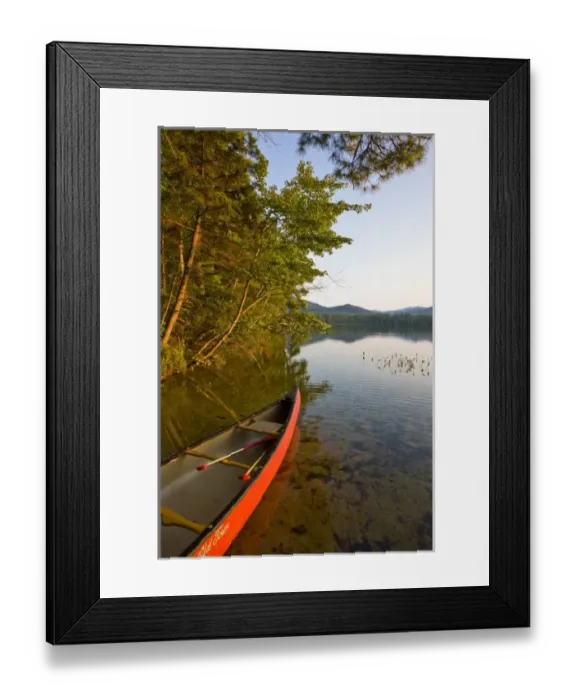 Framed Print : A canoe on the shore of White Lake at White Lake State Park in Tamworth, New Hampshire Framed Print : A canoe on the shore of White Lake at White Lake State Park in Tamworth, New Hampshire