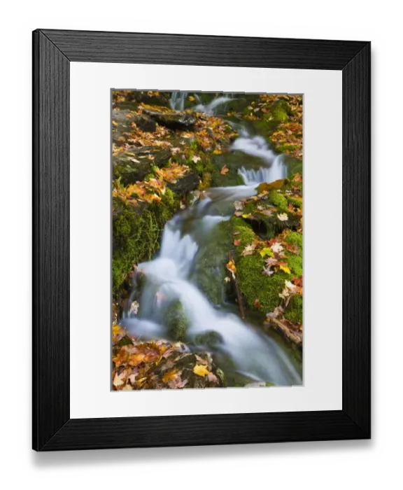 Framed Print : A small stream flows over moss-covered rocks in Vermonts Green Mountains Framed Print : A small stream flows over moss-covered rocks in Vermonts Green Mountains