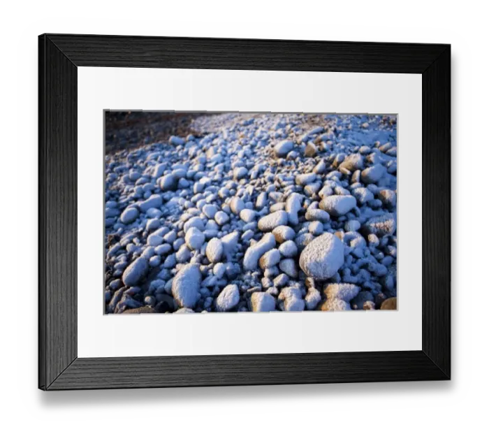 Framed Print : Fresh snow on cobble stones on the New Hampshire coast in Odiorne State Park in Rye, New Hampshire Framed Print : Fresh snow on cobble stones on the New Hampshire coast in Odiorne State Park in Rye, New Hampshire