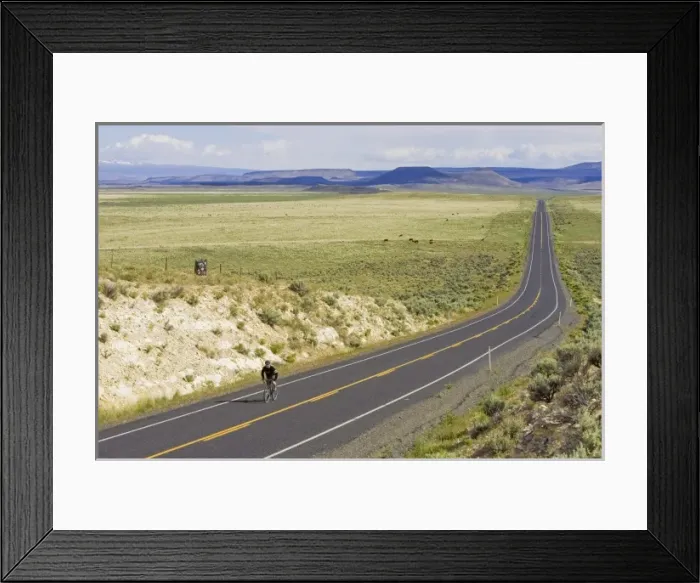Framed Print : Road cycling along Highway 205 between Burns and Frenchglen Oregon (MR) Framed Print : Road cycling along Highway 205 between Burns and Frenchglen Oregon (MR)