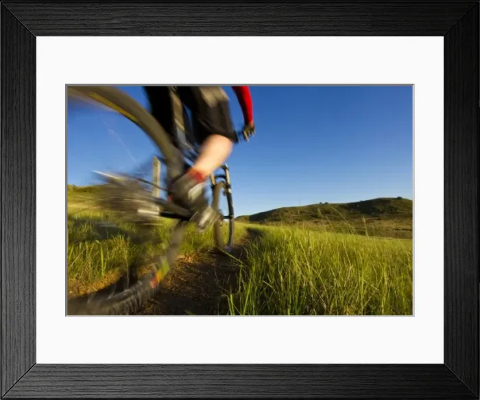 Framed Print : Mountain biker along the Buffalo Gap spur trail in the Little Missouri National Grasslands Framed Print : Mountain biker along the Buffalo Gap spur trail in the Little Missouri National Grasslands