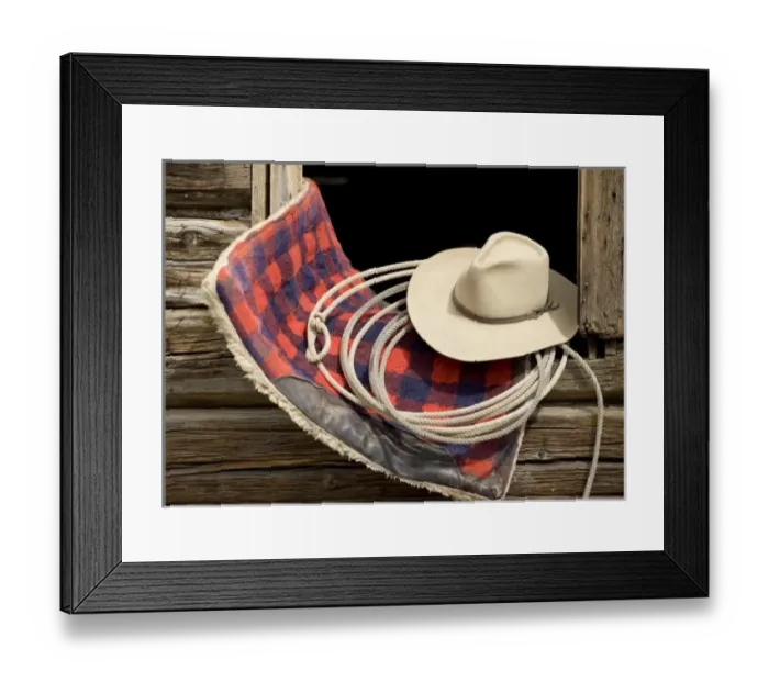 Framed Print : Oregon, Seneca, Ponderosa Ranch. Cowboy hat, rope and horse blanket sitting on