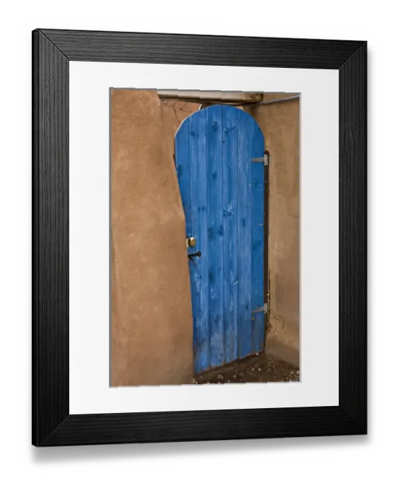 Framed Print : USA, New Mexico, Santa Fe. Blue door contrasts with tan adobe building Framed Print : USA, New Mexico, Santa Fe. Blue door contrasts with tan adobe building
