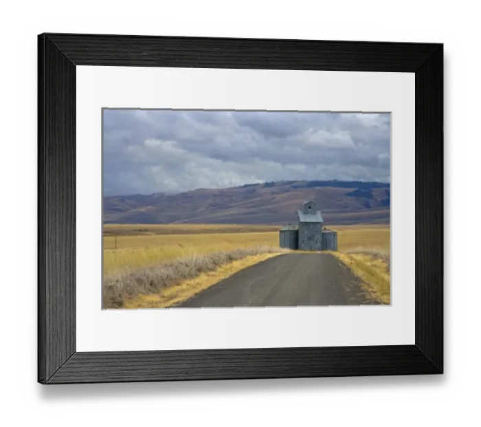Framed Print : Gravel Road leading up to Grain elevators in Eastern Oregon off of Hwy. 395 south Framed Print : Gravel Road leading up to Grain elevators in Eastern Oregon off of Hwy. 395 south