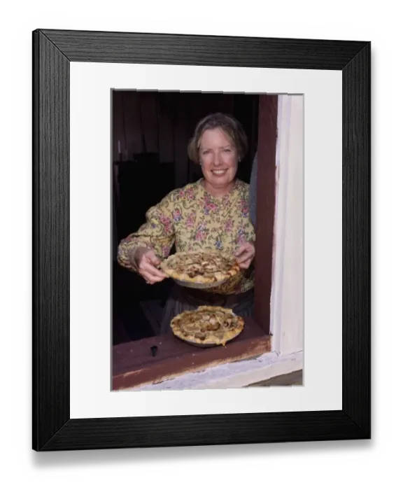 Framed Print : USA, Washington, Tacoma. Woman with fresh baked apple pies in kitchen window; 1850s Framed Print : USA, Washington, Tacoma. Woman with fresh baked apple pies in kitchen window; 1850s